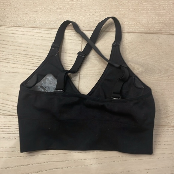 H & M sport black half top with padding.  XS - Picture 3 of 3